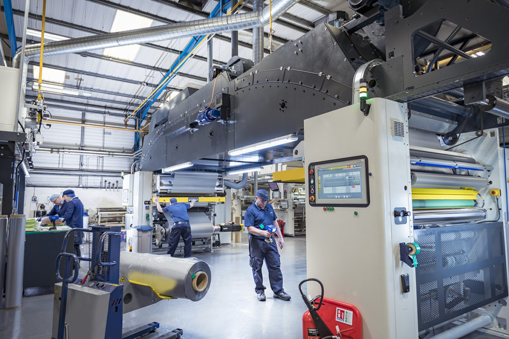 Parkside confirms new lamination machine investment Men working in factory