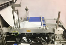 E-commerce print and apply labelling solution from YPS Machinery with postage bags