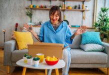 Macfarlane Packaging launches ninth annual unboxing survey Woman opens box