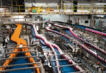 New Lucozade bottles unveiled following £6.3m investment Aerial of new bottle machines