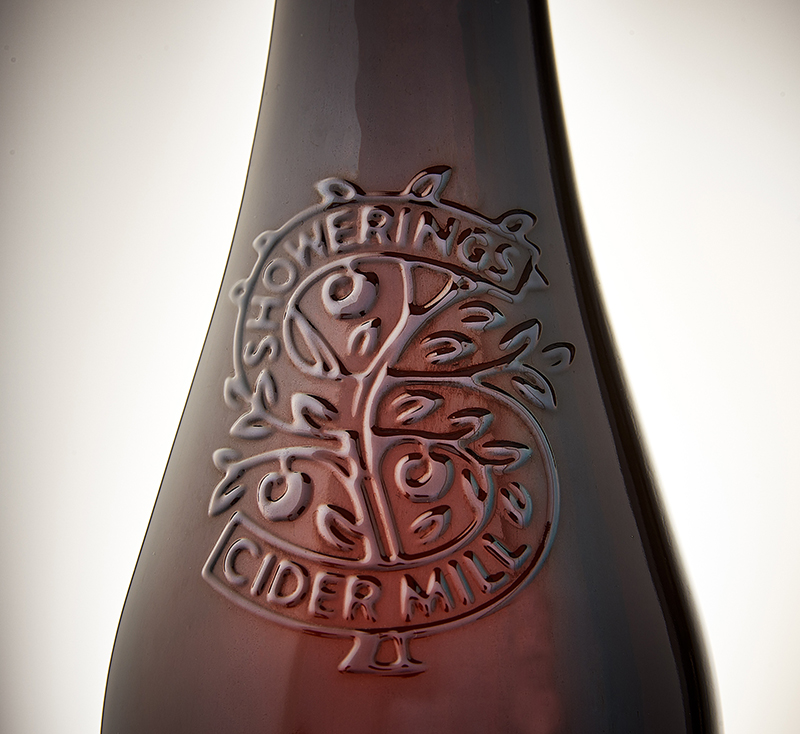 Glass bottle with embossing