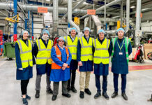 MP visits Coveris’ fibre-based packaging ‘centre of excellence’ Group photo of MP's visit to Coveris manufacturing site
