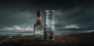 Whisky bottle with atmospheric background