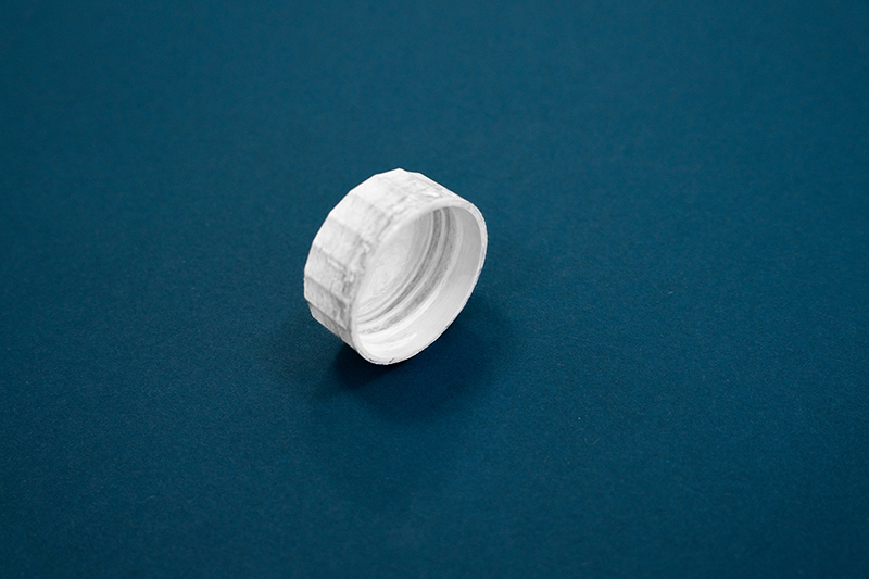 Fibre-based cap solution