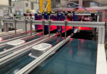 Aluminium tray specialist invests in advanced vision technology Trays being inspected on production line