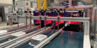 Trays being inspected on production line