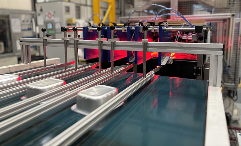Trays being inspected on production line