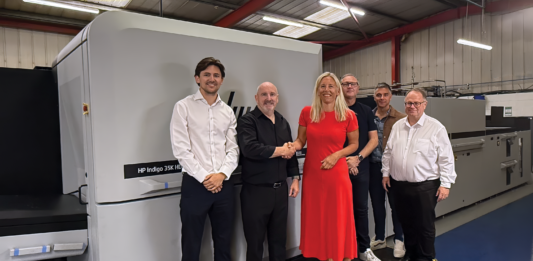 Blantyre firm launches short-run packaging service following digital press investment Digital press being handed over at Gavin Watson Ltd