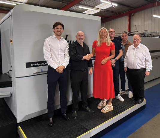 Blantyre firm launches short-run packaging service following digital press investment Digital press being handed over at Gavin Watson Ltd