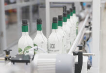 New agreement marks major milestone for paper bottle innovation Paper bottles on production line