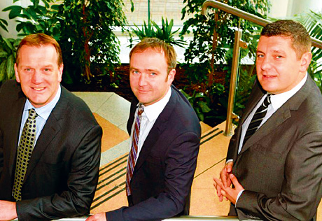 05b_1012 Fraser Black, managing director of BioCity Scotland (left), welcomes Insignia Technologies’ Erik Smyth and Stephen Currie to the firm’s new headquarters in Newhouse.
