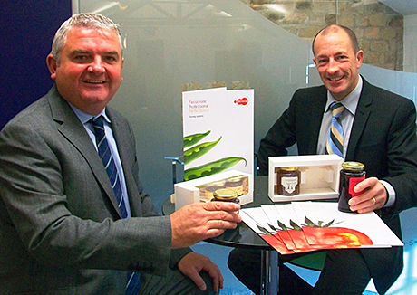 The cap fits Chris Milnes, left, and PPS managing director Simon Bell with examples of Technocap lids.