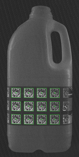 Milk bottle with invisible UV-tagged labels